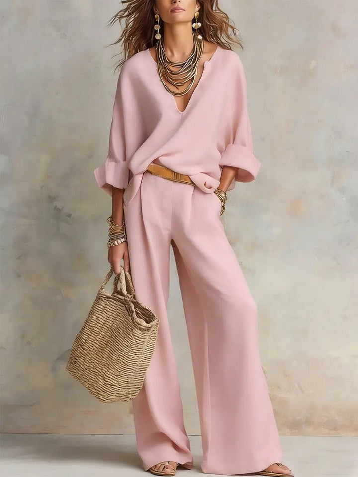 Relaxed fit women's linen wide leg V-neck set, a versatile two-piece outfit for summer comfort.