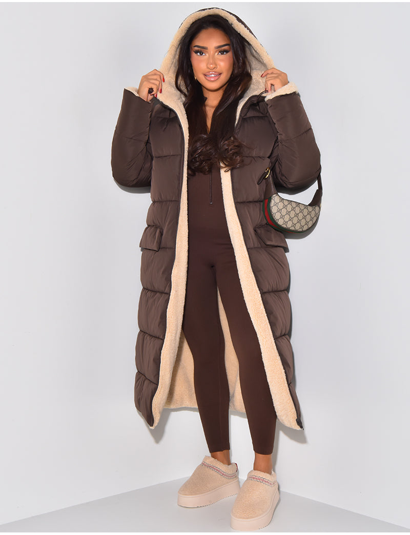 Warm quilted women's long puffer jacket, a cozy winter coat for cold weather. Everyday casual fashion essential.