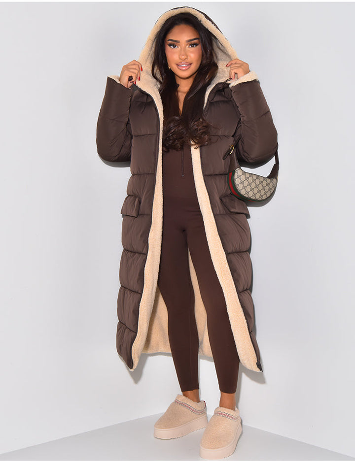 Warm quilted women's long puffer jacket, a cozy winter coat for cold weather. Everyday casual fashion essential.