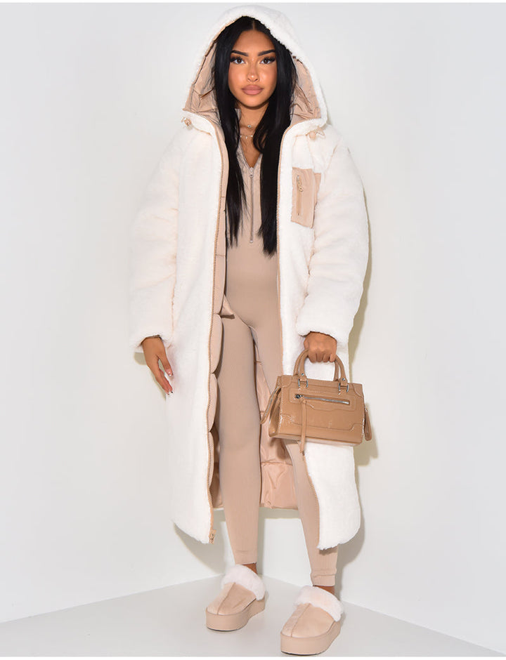 Elegant women's long puffer jacket, a cozy hooded winter coat for cold weather. Stylish everyday outerwear.