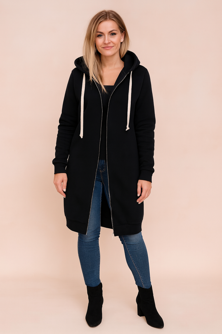 Women's long cozy sweater in elegant knit pattern, perfect for winter fashion.