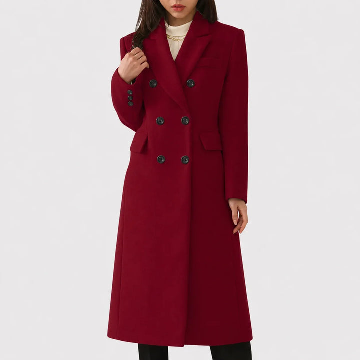 Classic women's long trench coat, double-breasted and notched lapel. Elegant fall & winter fashion outerwear.