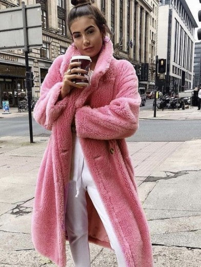Stay warm and stylish with this elegant faux fur long jacket for women.