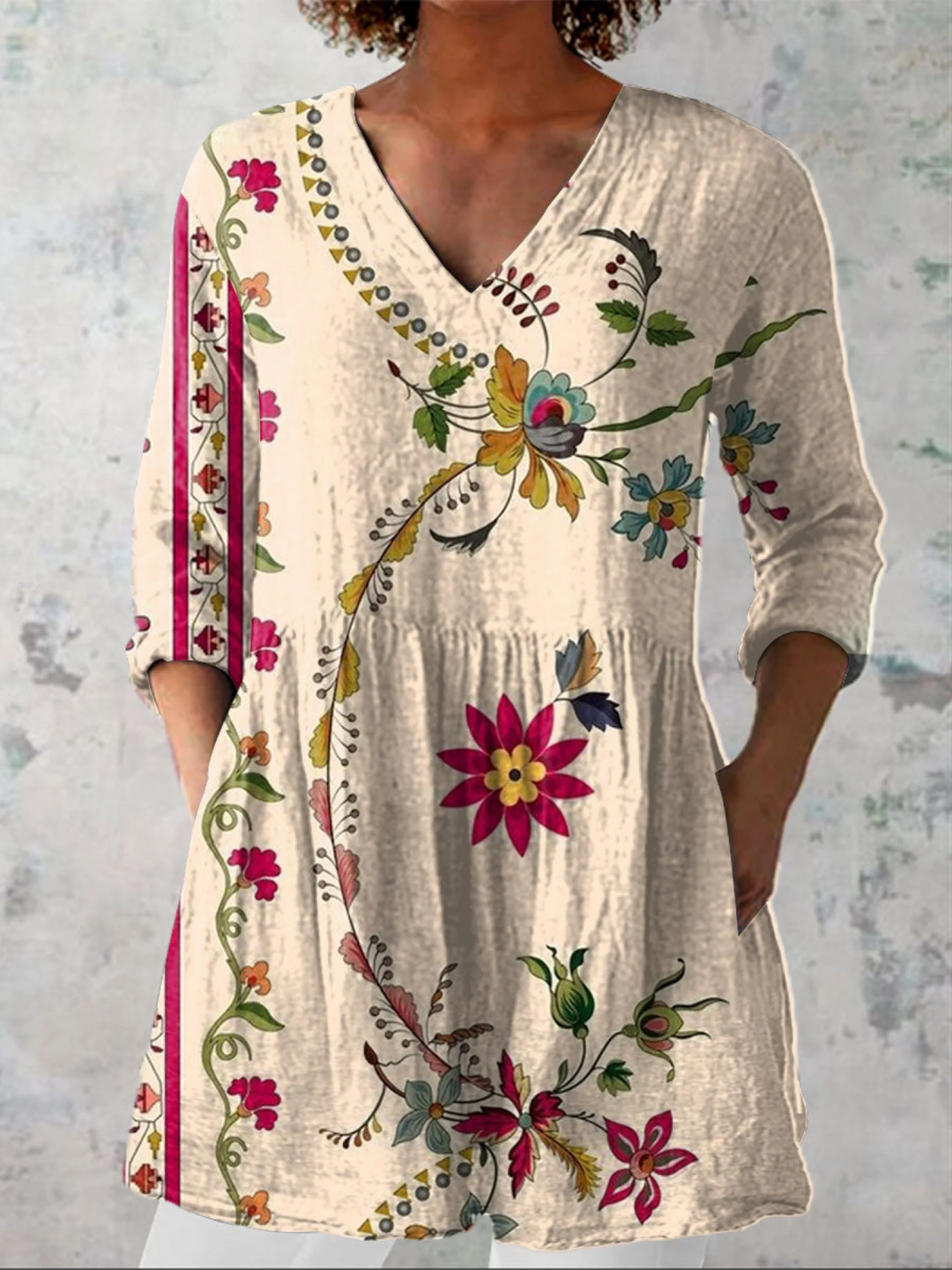 Women's long flowy beige V-neck blouse in a tunic style, offering casual elegant and effortless comfort fit.