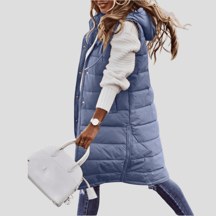 Women's long hooded bodywarmer vest in black, perfect for fall & winter layering. Padded sleeveless jacket.