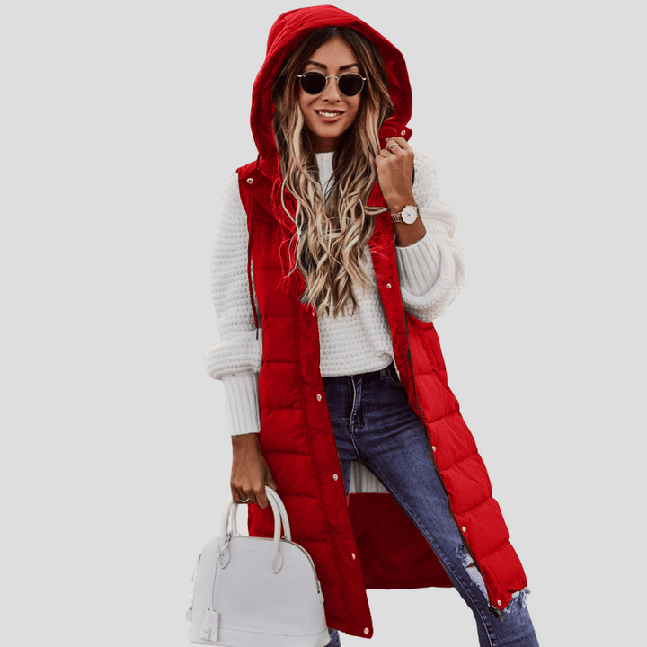 Stylish women's long hooded vest, a comfortable padded bodywarmer & chic sleeveless jacket for casual wear.