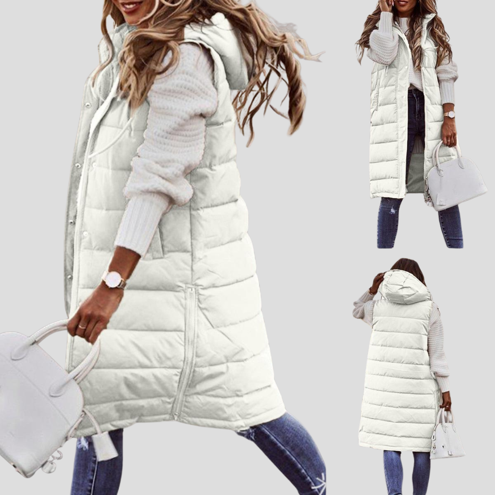Warm women's long hooded bodywarmer vest, ideal sleeveless jacket for outdoor activities & transitional layering.