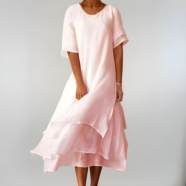 Elegant flowy sundress for women, perfect as a lightweight beach cover-up or a casual summer vacation dress.