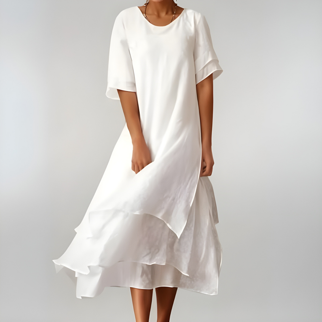 Comfortable women's long lightweight dress with a flowy silhouette, ideal for hot summer days & casual elegance.