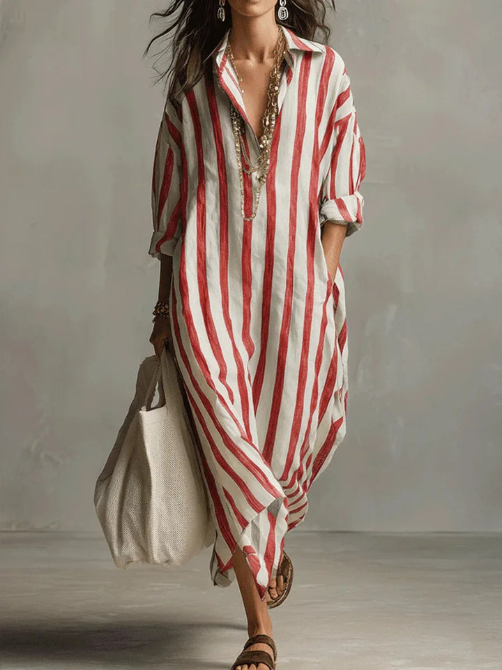 Flowy women's striped maxi V-neck shirt dress, offering an elegant casual look.