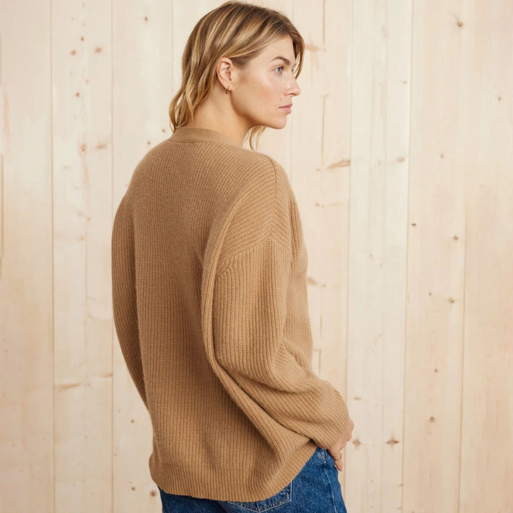 Soft knit long oversized cardigan, a versatile women's clothing item for winter comfort and effortless style.