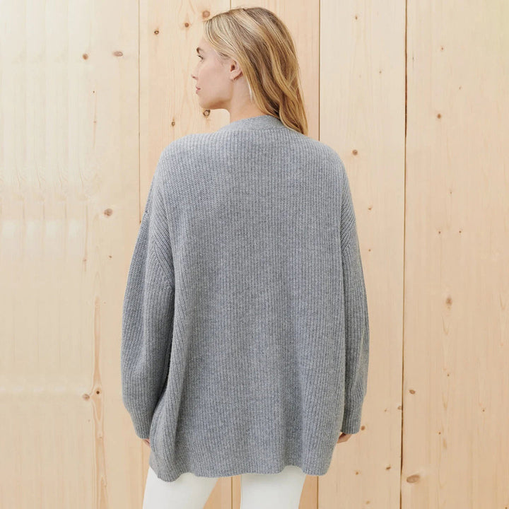 Cozy long oversized cardigan for women, designed for ultimate winter comfort and stylish layering over any outfit.