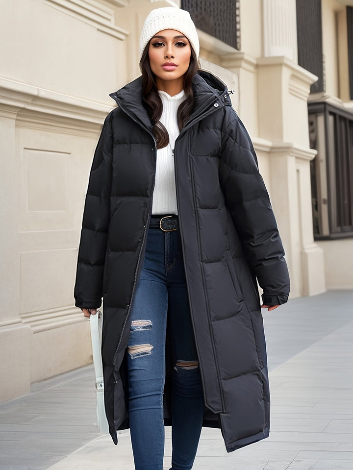 Stylish women's long padded winter coat with hood, providing warmth & a chic look in cold weather.