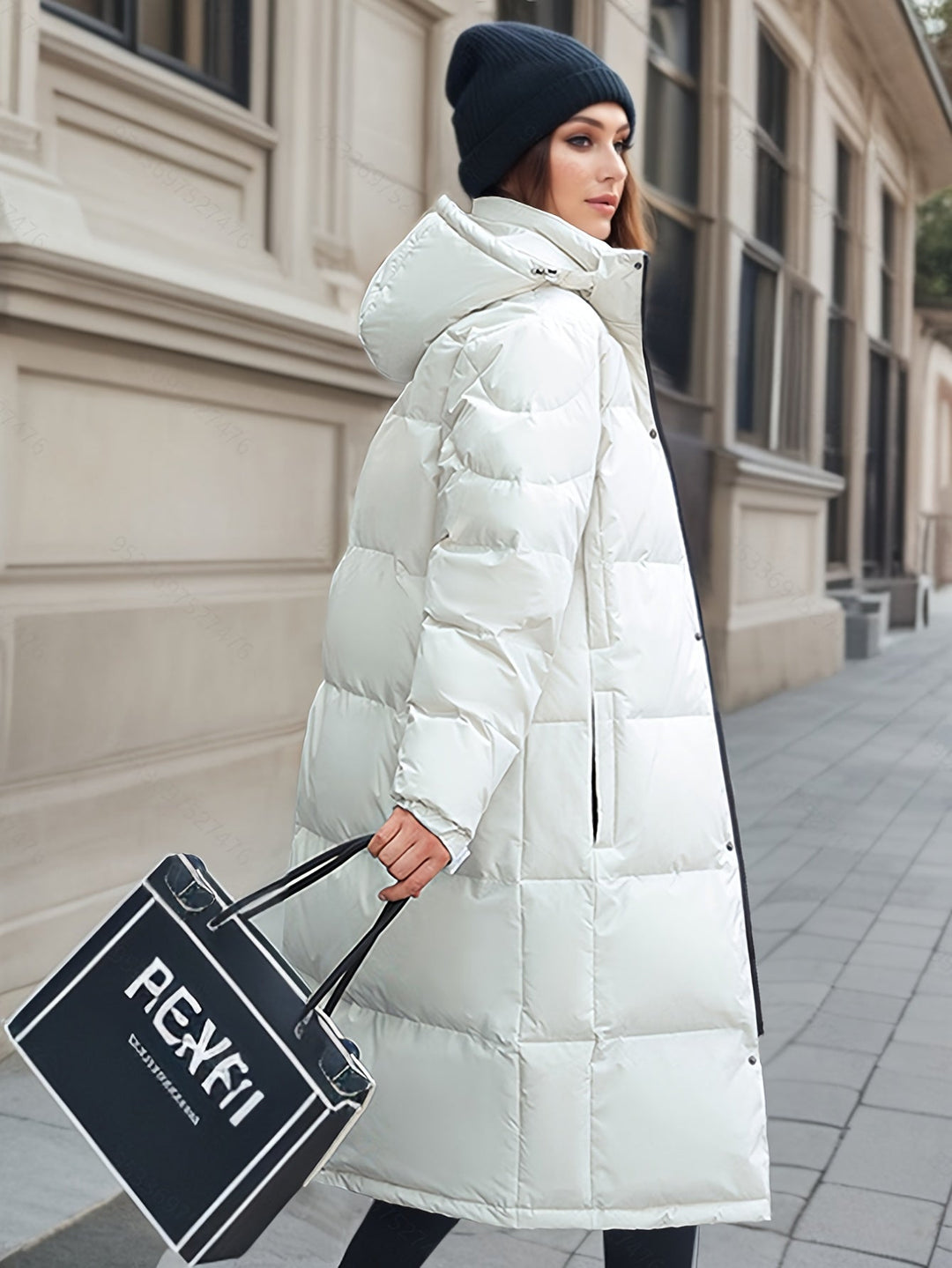 Full-length women's padded winter coat with a hood, offering maximum warmth & stylish coverage.