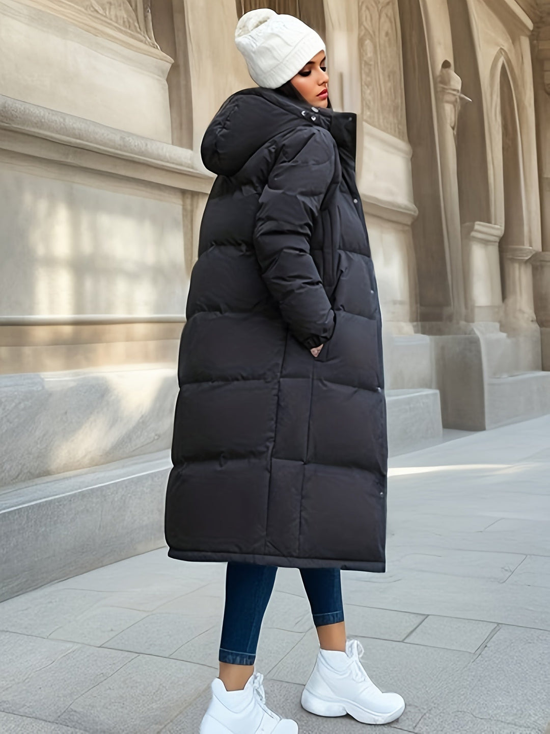 Casual women's long padded hooded winter jacket, comfortable and warm everyday outerwear.