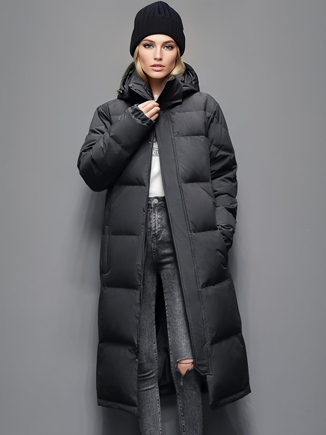 Sophisticated women's long padded winter coat with hood, for elegant cold-weather style.