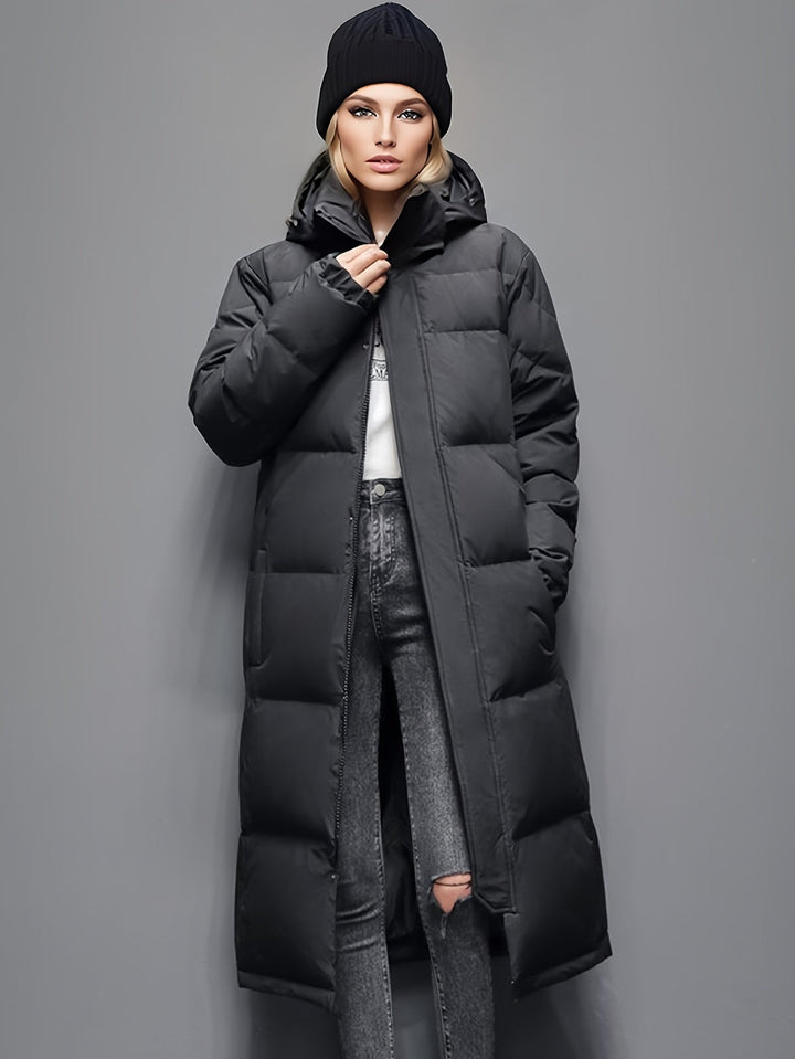 Sophisticated women's long padded winter coat with hood, for elegant cold-weather style.