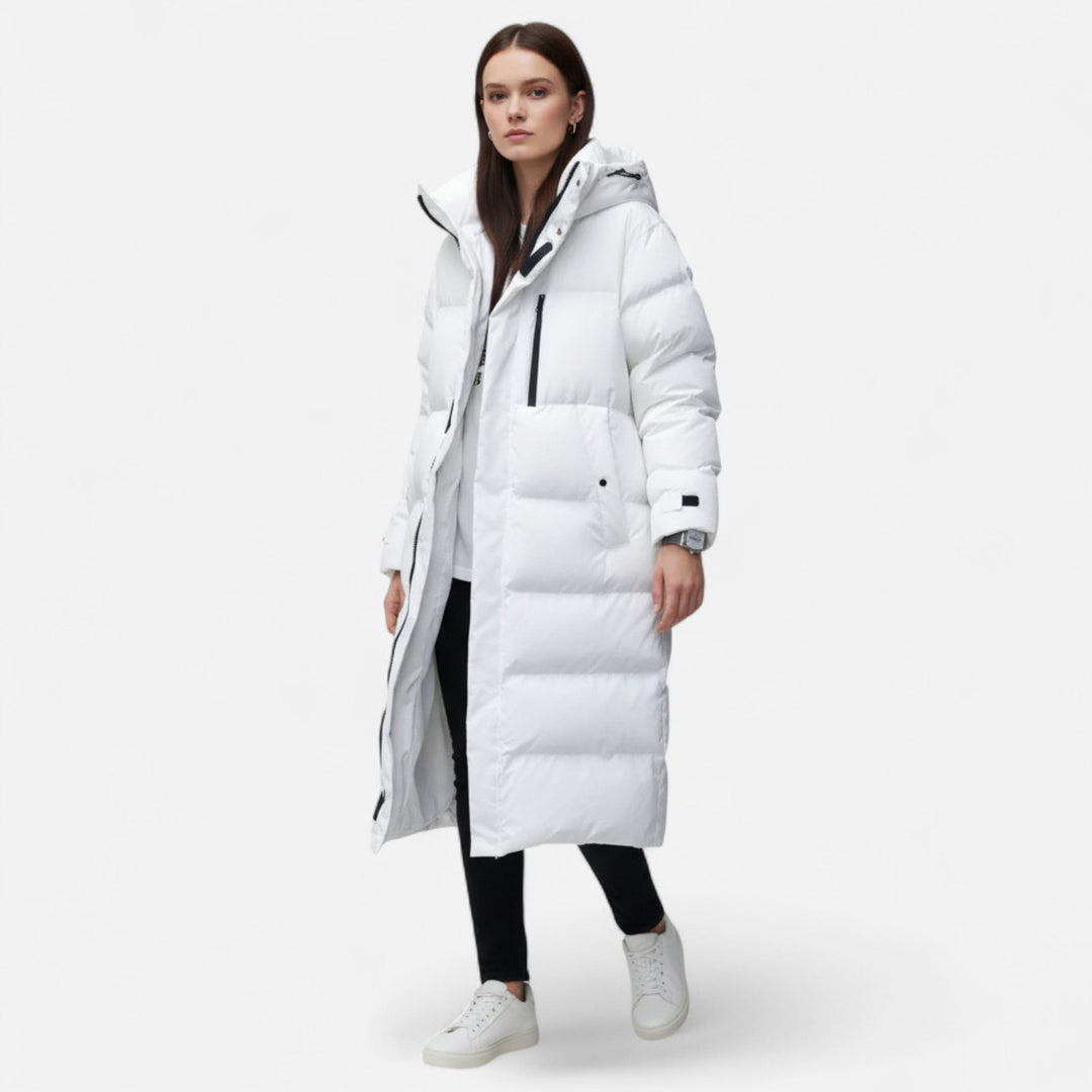 Elegant women's long puffer jacket, a cozy and stylish winter coat for ladies. Perfect warm outerwear for cold weather.