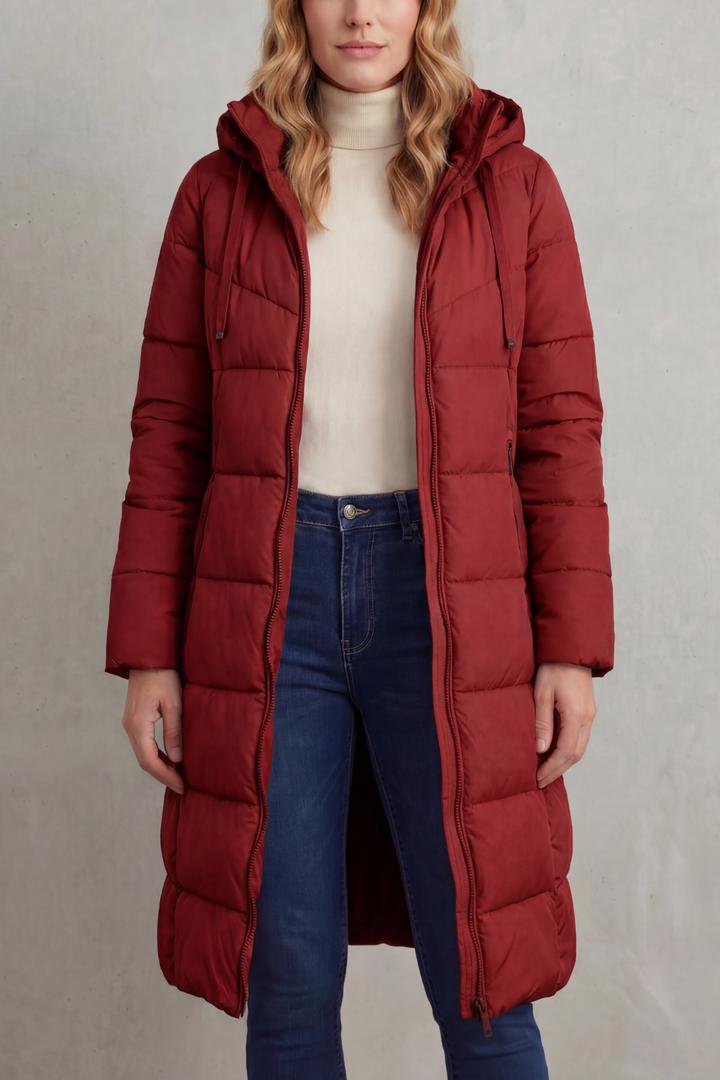 Warm women's long quilted puffer coat, perfect winter outerwear. Stylish & flattering fit for cold weather.