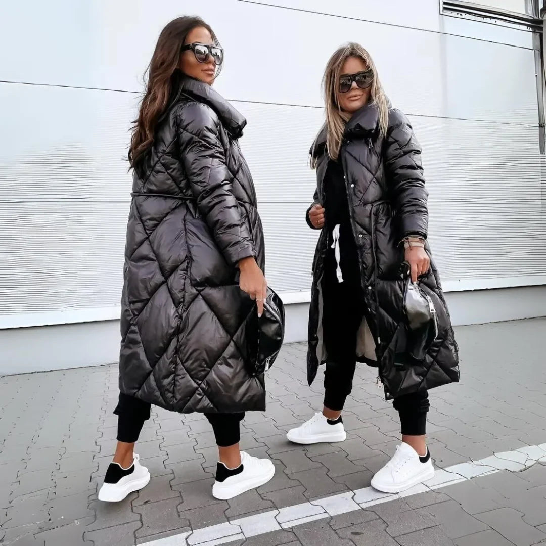 Elegant women's long quilted puffer coat featuring a high stand-up collar, ideal for winter fashion.