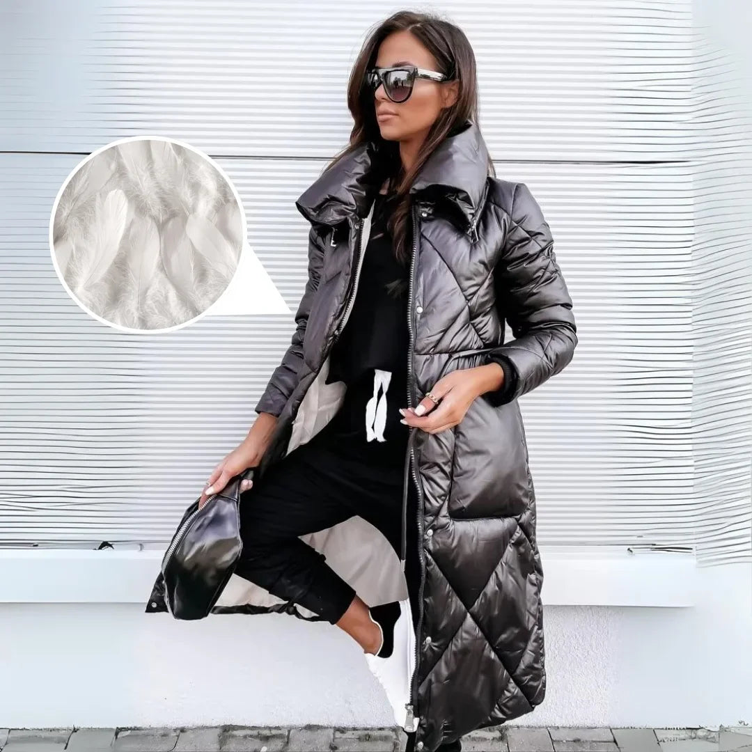 Women's long quilted puffer coat with stand-up collar, an essential warm and stylish winter trench.
