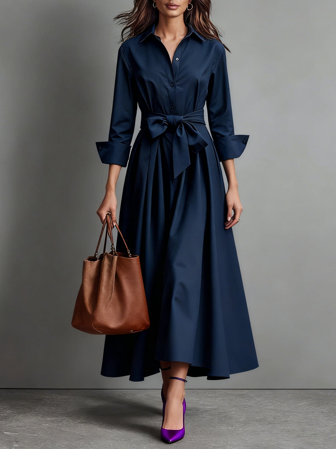 Elegant women's long sleeve midi dress featuring a full button-front, flattering A-line silhouette, and stylish tie waist.