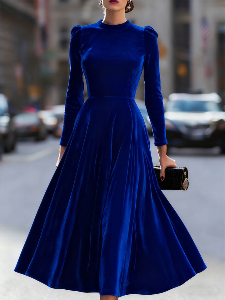 Beautiful A-line long sleeve midi dress, perfect as a wedding guest outfit, cocktail dress, or evening gown.
