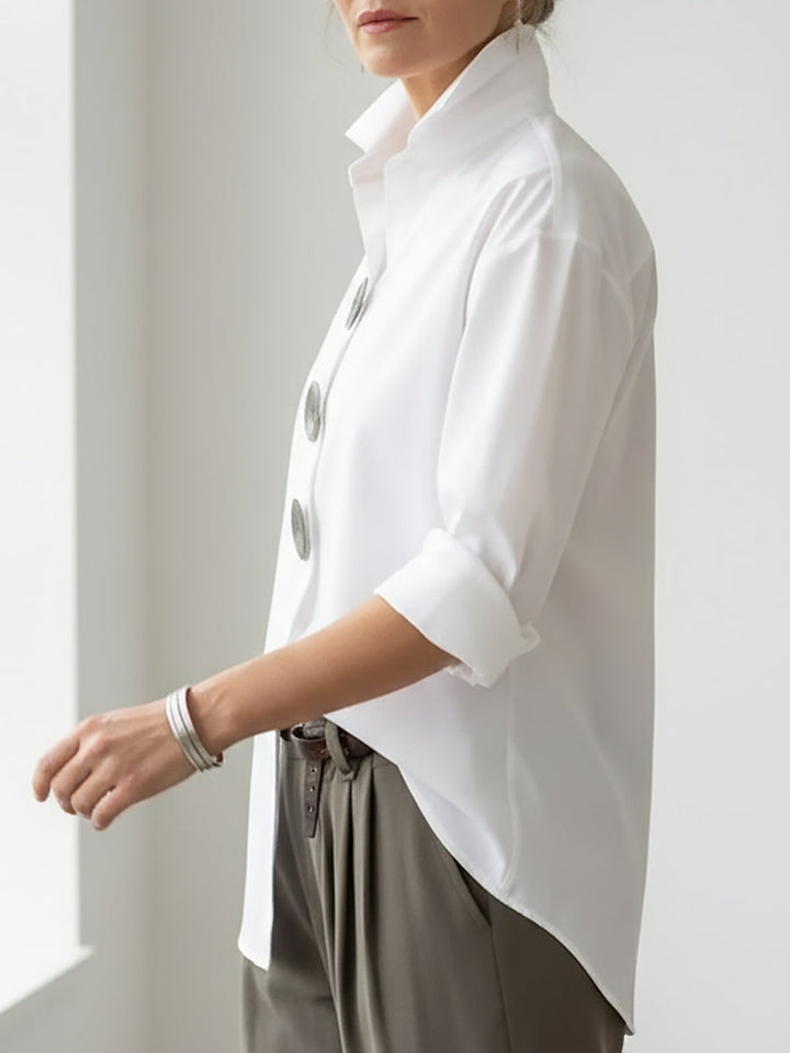 Comfortable women's long sleeve casual top with button front, stand collar; great for everyday wear.