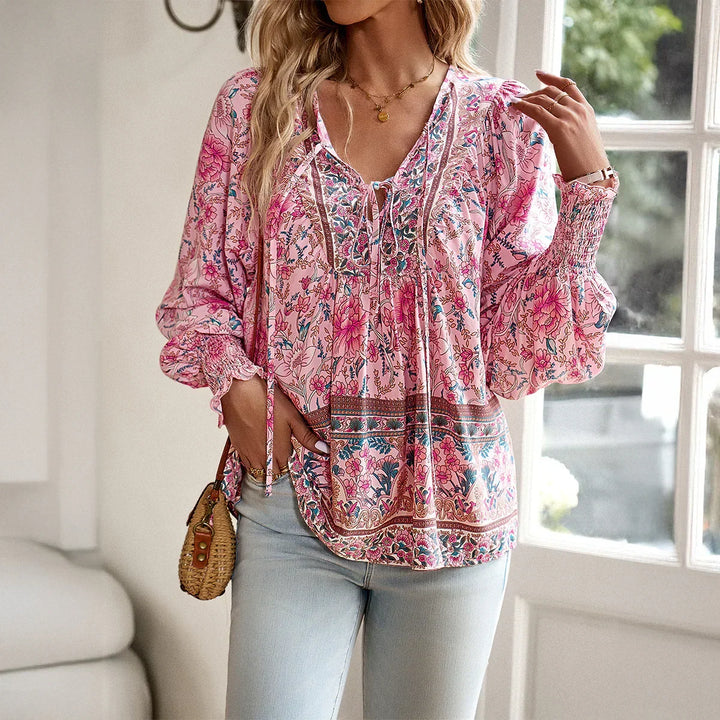 Elegant women's long sleeve bohemian v-neck shirt. Versatile print blouse, perfect for stylish casual outfits.
