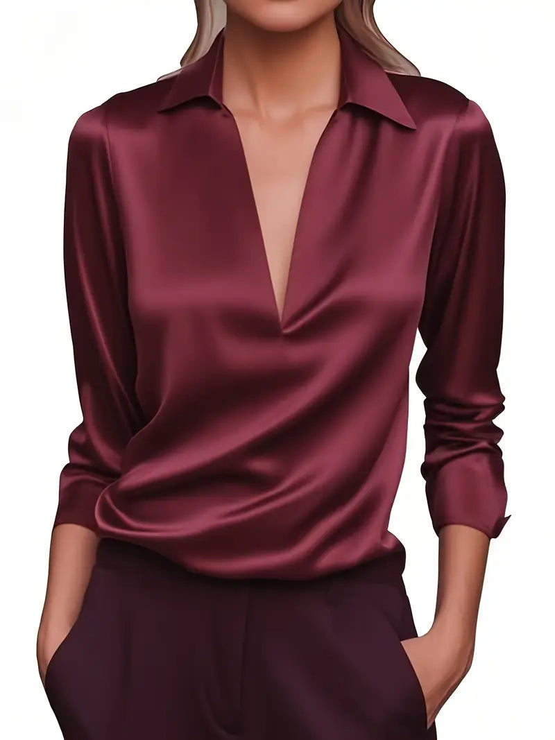 Crisp white women's long sleeve collared V-neck blouse, a classic elegant top for all occasions.