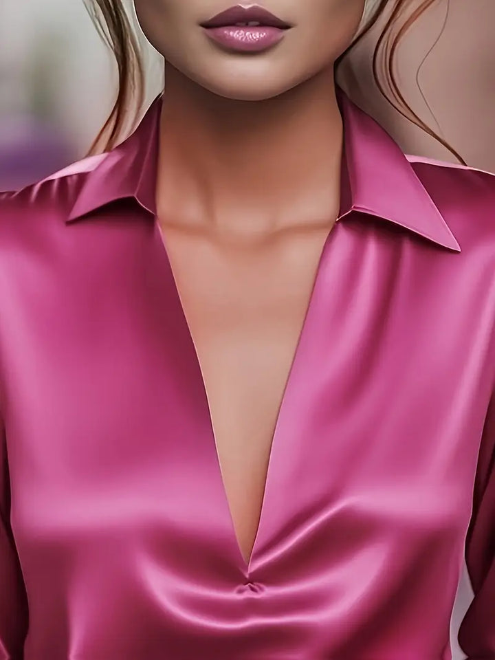 Front view: Pink women's long sleeve collared V-neck blouse, elegant workwear for a polished look.