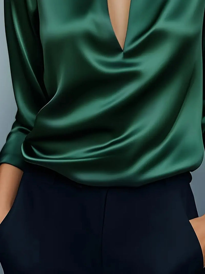 Side view: Black women's long sleeve V-neck blouse with a collar, showcasing its versatile fashion.