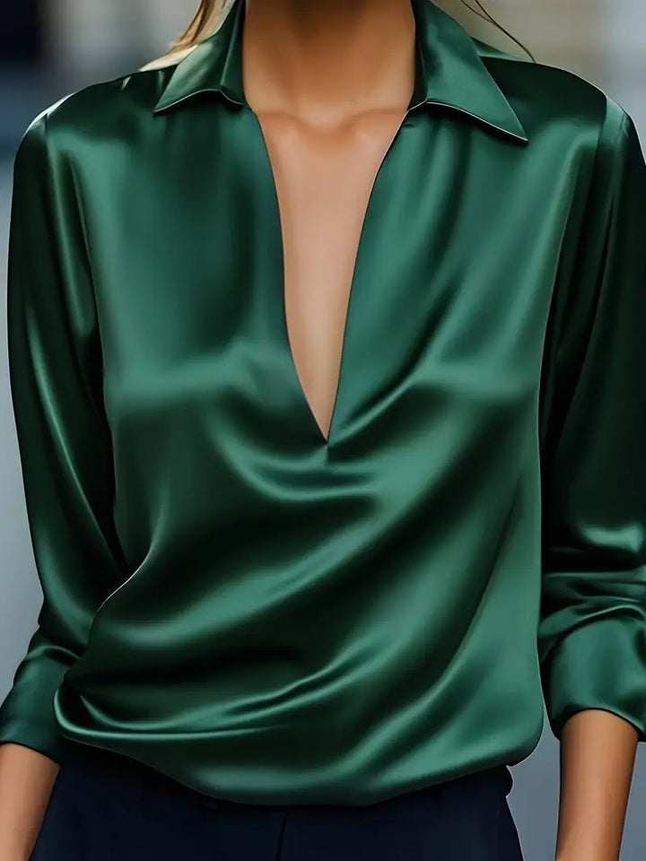 Comfortable and elegant long sleeve V-neck blouse for women with a classic collar, perfect business casual.