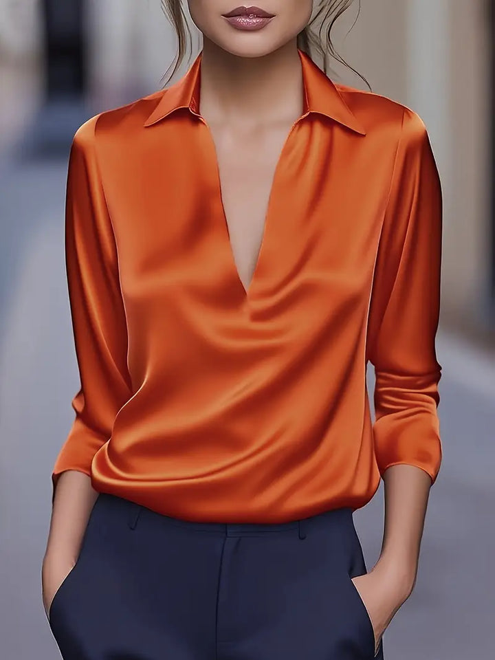 Elegant women's collared V-neck long sleeve blouse, featuring a flattering neckline & sophisticated collar.