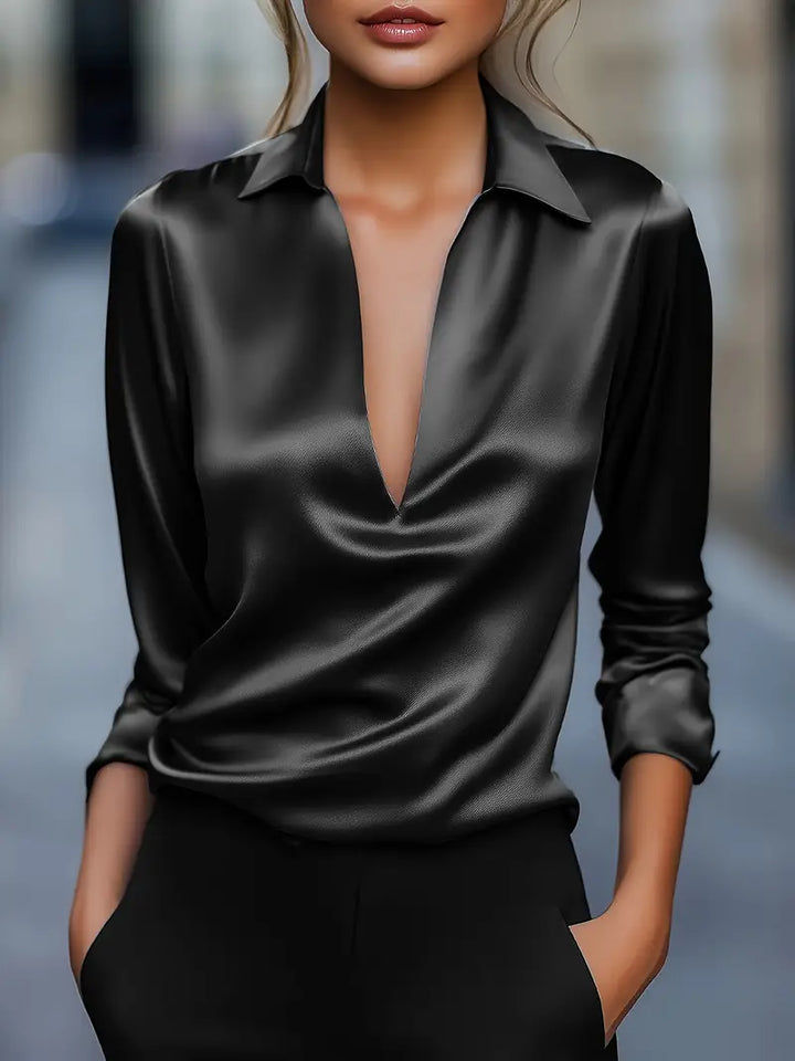 Women's collared V-neck long sleeve blouse, expertly styled for chic office fashion.