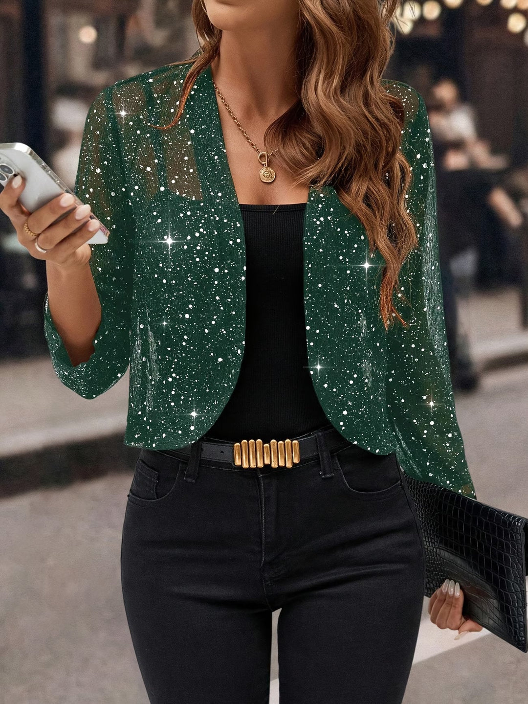 Shimmering women's sequin & glitter overlay cardigan jacket, ideal for a sparkling party fashion look.