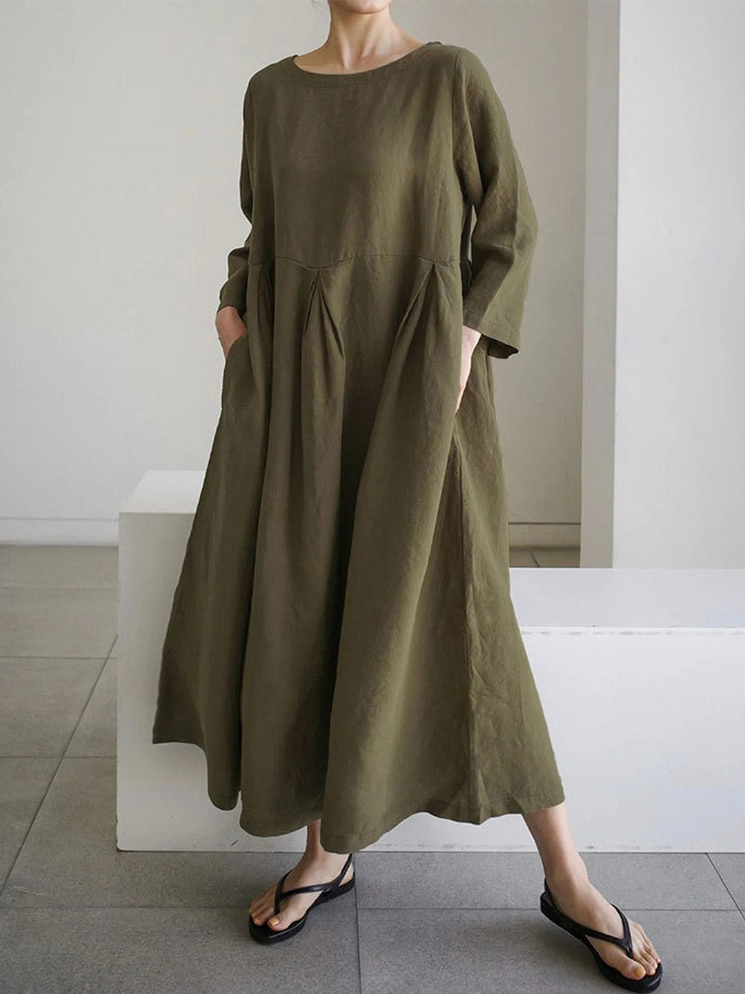 Elegant women's tiered long sleeve maxi dress with round neck & pockets; relaxed fit, ideal for casual or weekend wear.
