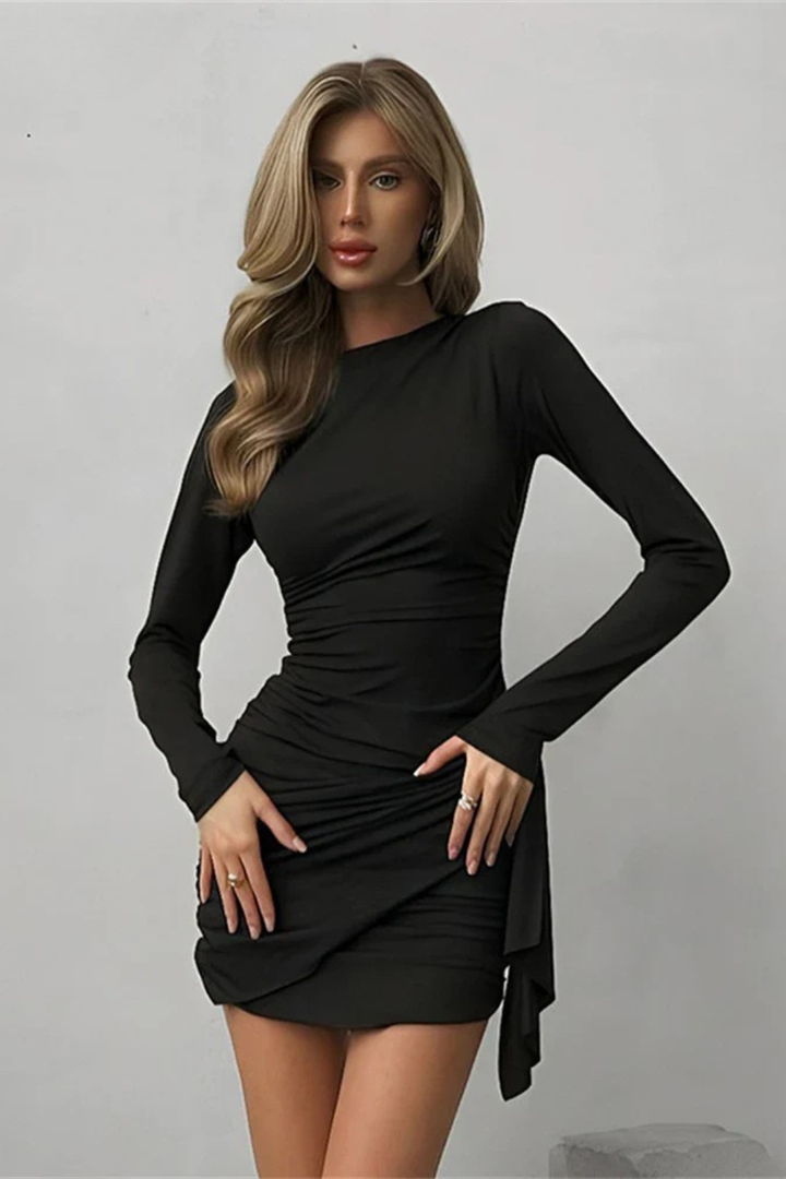 Fashionable women's long sleeve mini dress with ruched wrap design. Great for elegant occasions.