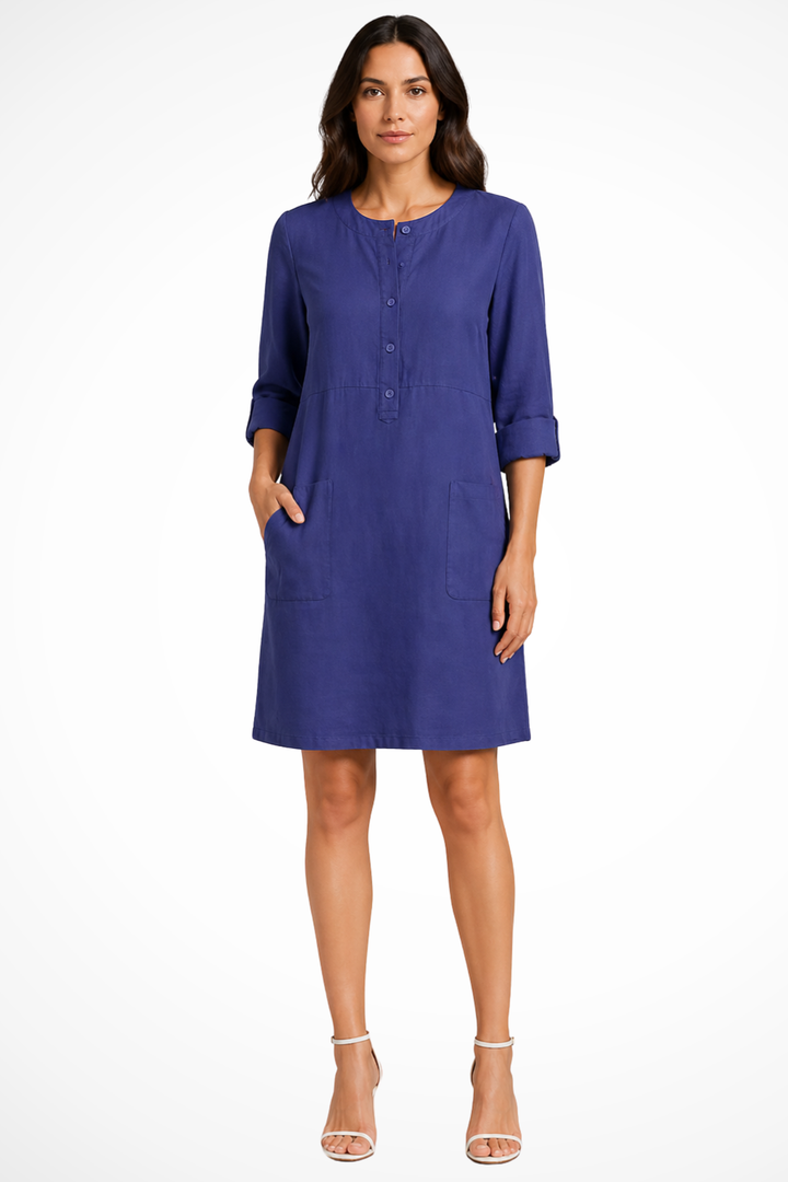 Chic women's long sleeve shirt dress featuring front pockets. Perfect for spring & fall casual outfits.