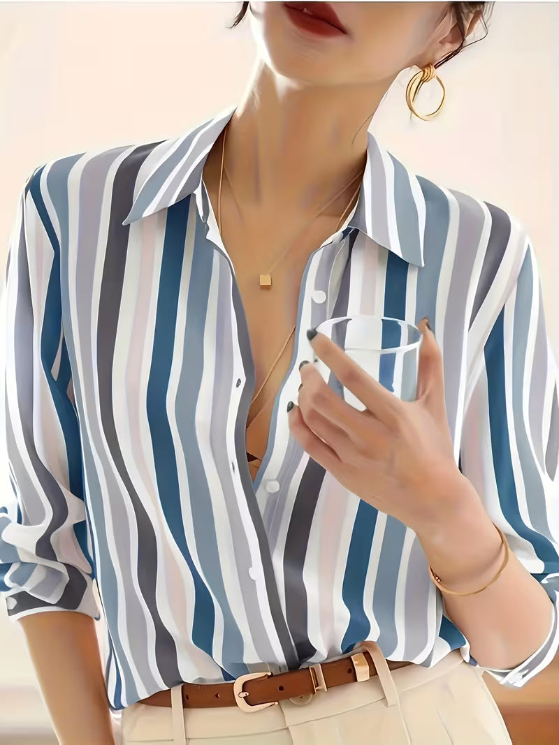 Chic women's striped button-up long-sleeve shirt, a fashionable and comfortable top for all occasions.