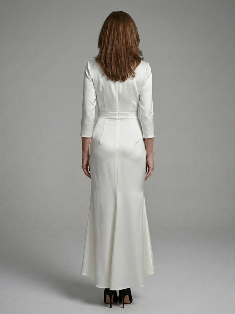 Stylish women's long sleeve wrap dress. High-low midi length and tailored fit, ideal for elegant cocktail events.