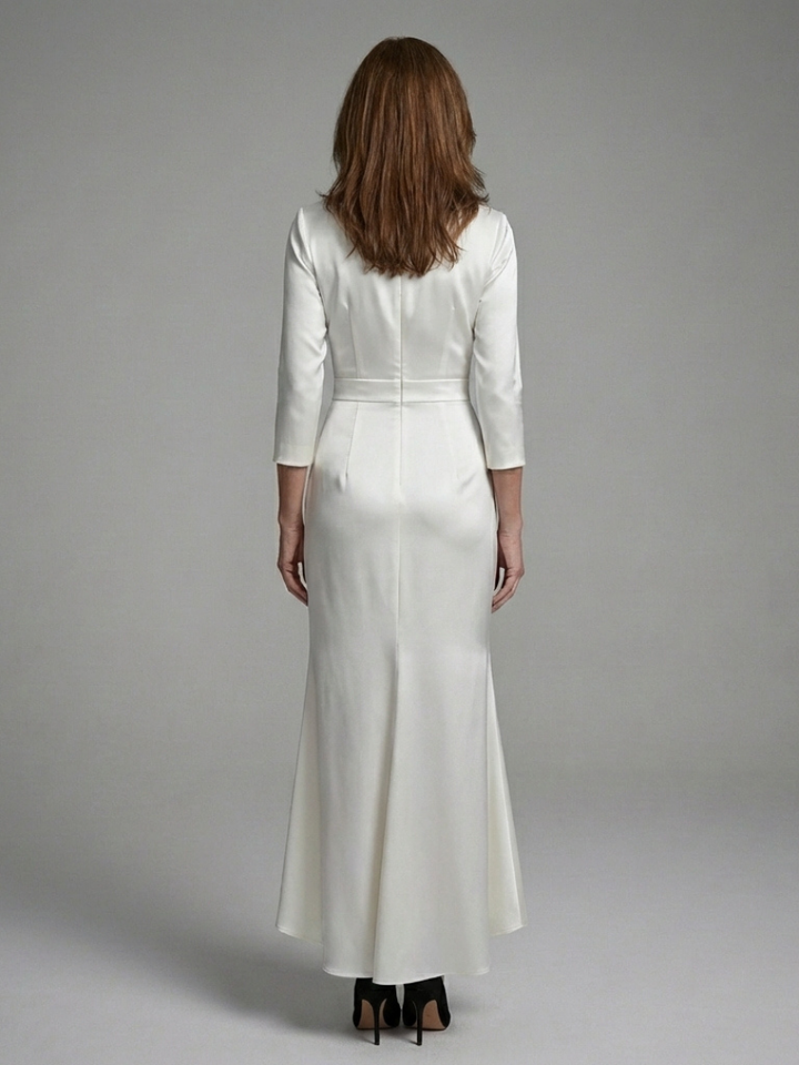 Stylish women's long sleeve wrap dress. High-low midi length and tailored fit, ideal for elegant cocktail events.
