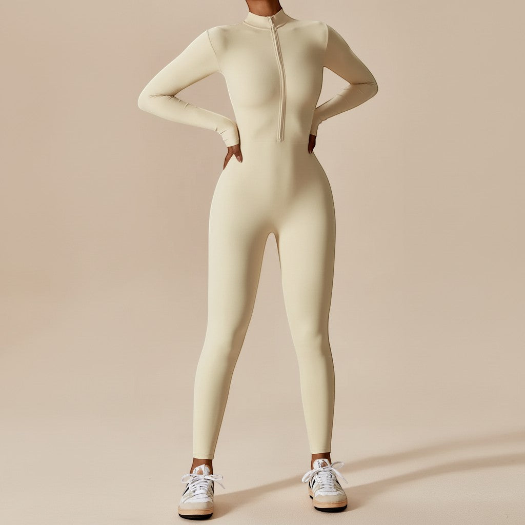 Contouring women's long sleeve jumpsuit with zip front, designed for a modern and sculpted fit, versatile wear.