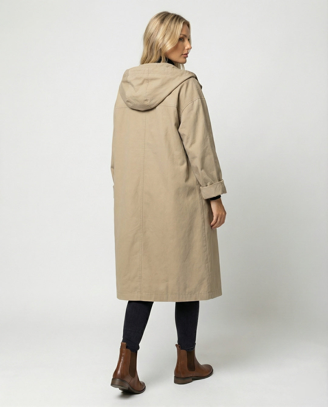 Stylish women's trench coat, offering waterproof and windproof protection in a long silhouette.