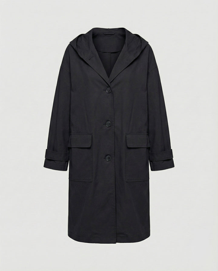 Durable and chic women's waterproof trench coat, ideal for staying dry and fashionable in windy weather.