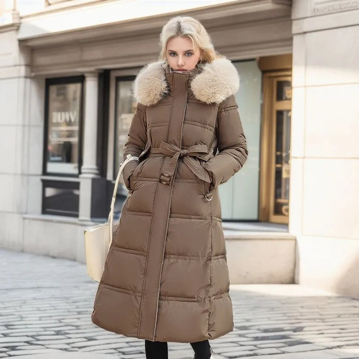 Stylish women's outerwear: long winter coat with detachable fur hood.