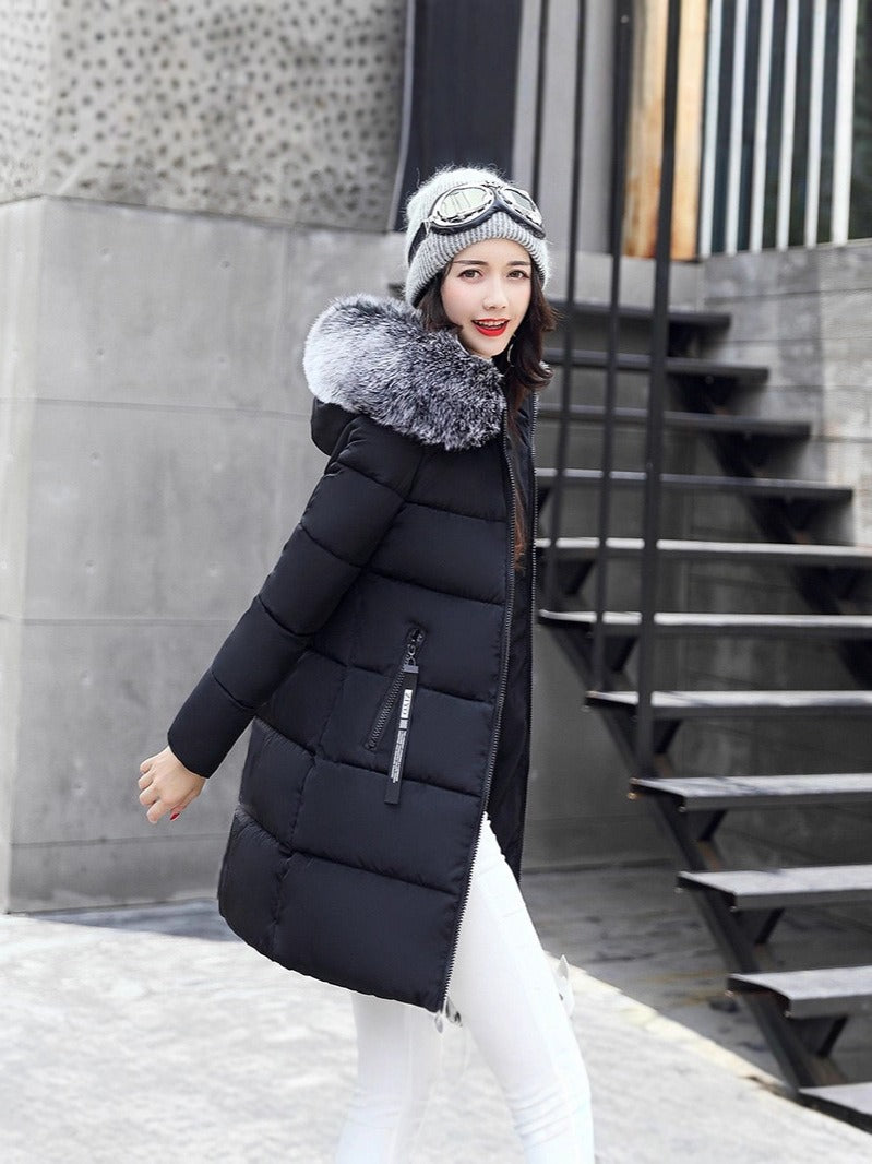 Stylish hooded winter parka for women, providing warmth and fashionable outdoor wear