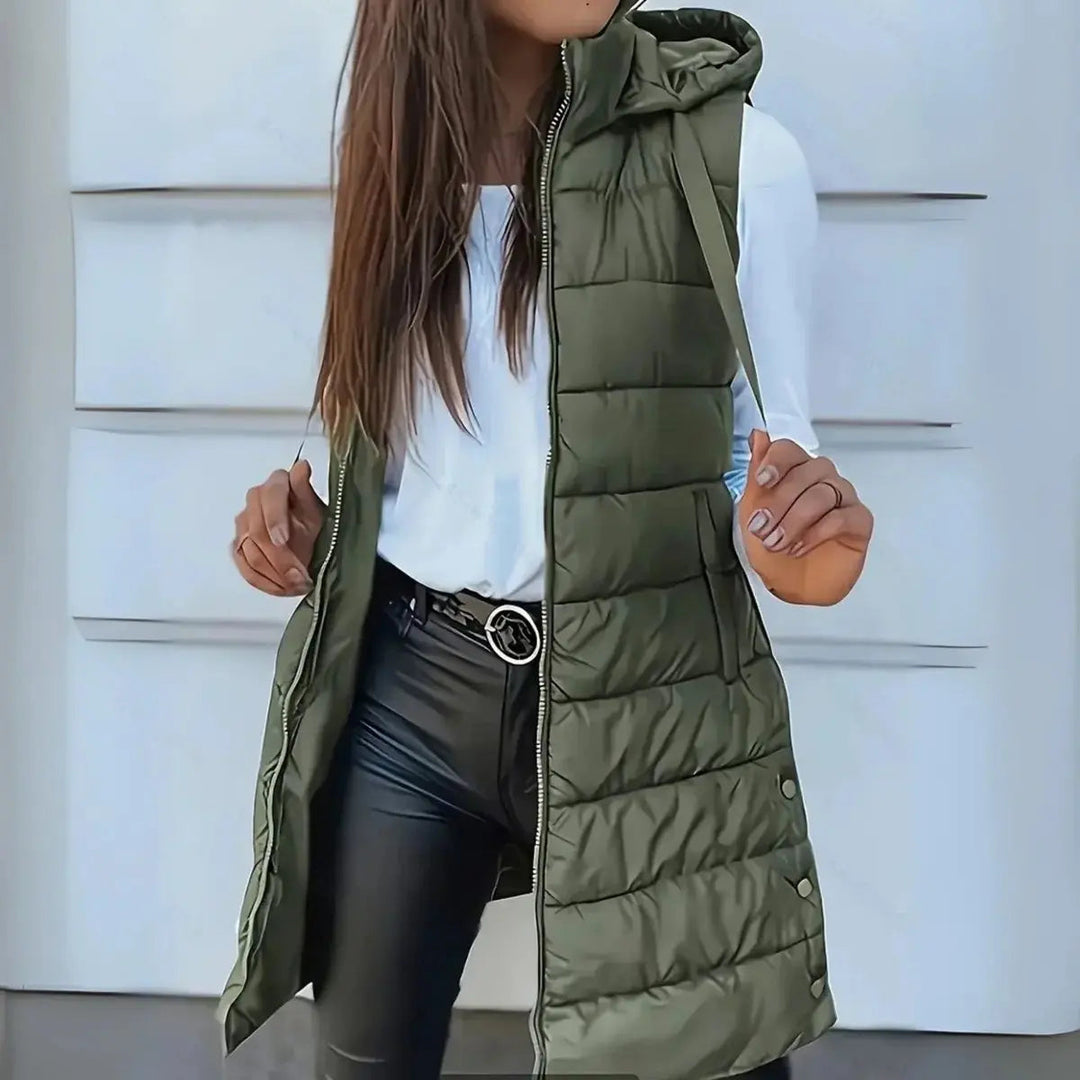 Close-up of lightweight women's puffer vest material, highlighting quilted design & soft, warm texture.