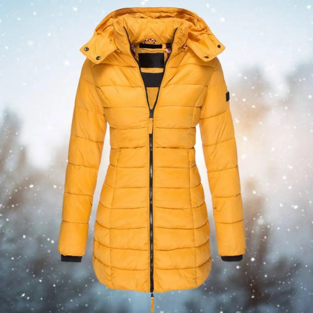 Quilted longline puffer jacket for women, soft and warm winter coat with hood, perfect for cold weather fashion.