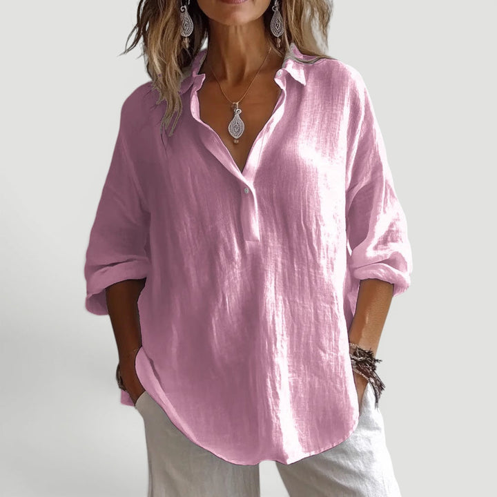 Comfortable women's casual blouse, ideal for summer fashion & relaxed everyday wear. Effortless style.